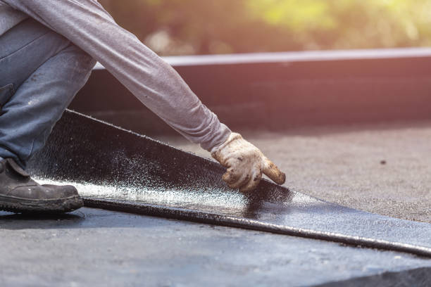 Professional Exterior Waterproofing technician working in East Islip, NY
